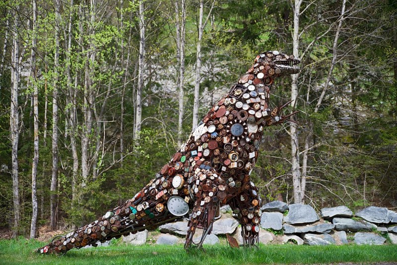 Dinosaur sculpture made from old clocks