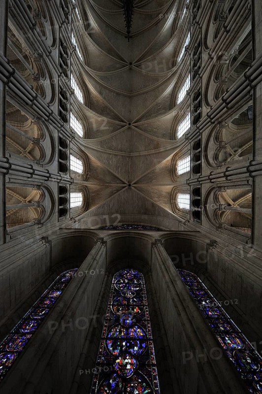 Vaulted ceiling and stained-glass windows