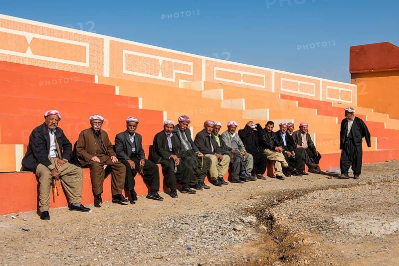 Meeting of elderly Kurdish men