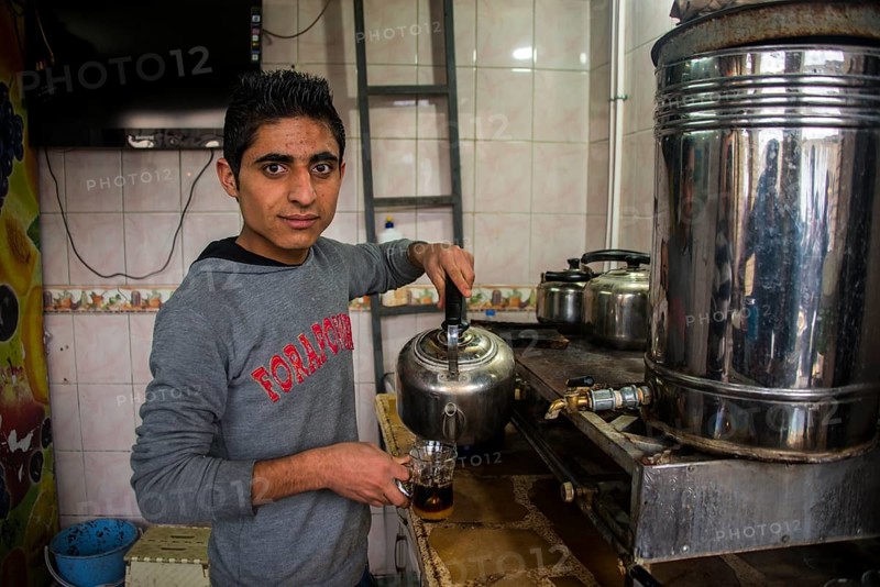 Boy selling tea