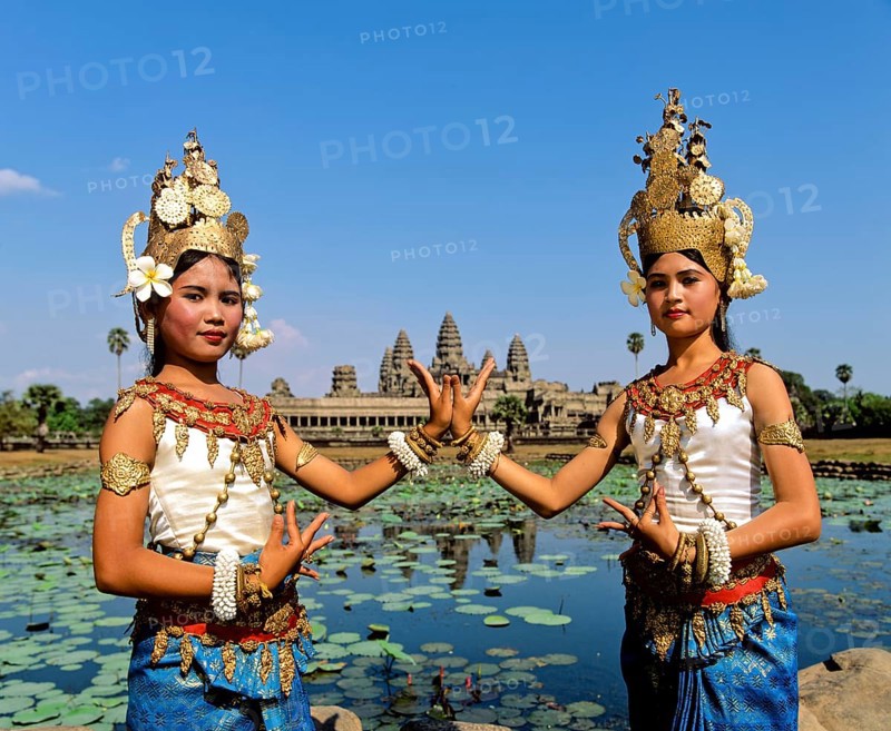 Temple dancers or apsaras at the Lotus Pond in front of the temple of Angkor Wat
