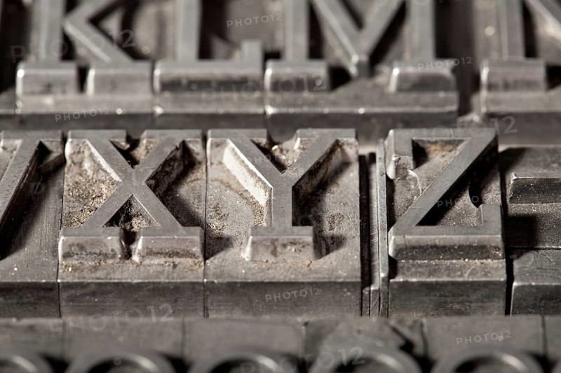 Old lead letters in detail with the letters XYZ