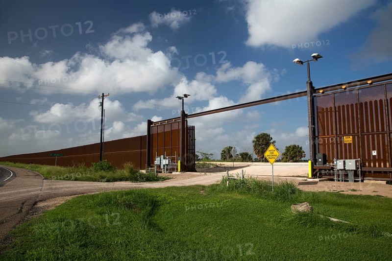 A nearly-completed section of the border fence that separates the United States from Mexico