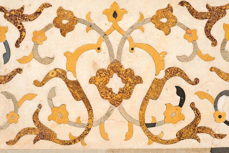 Intricate marble inlay of an Islamic mausoleum