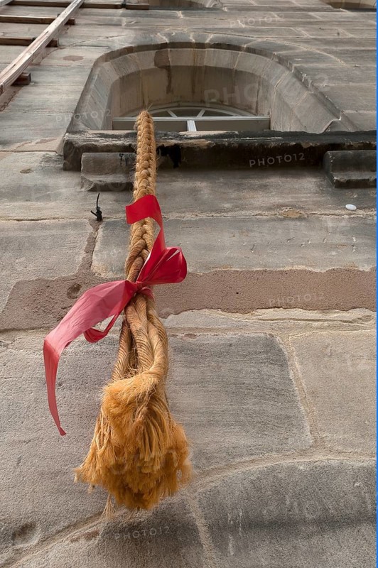 A long braid hanging from the tower window
