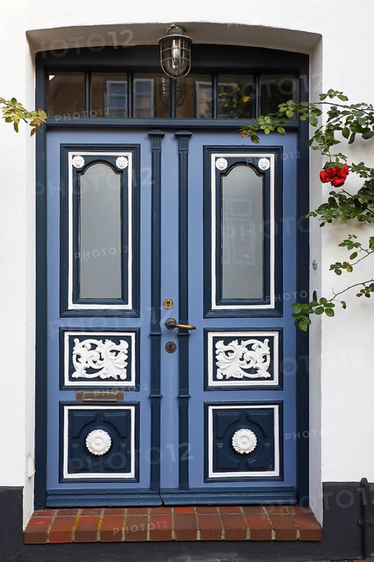 Historical house with decorative wooden door