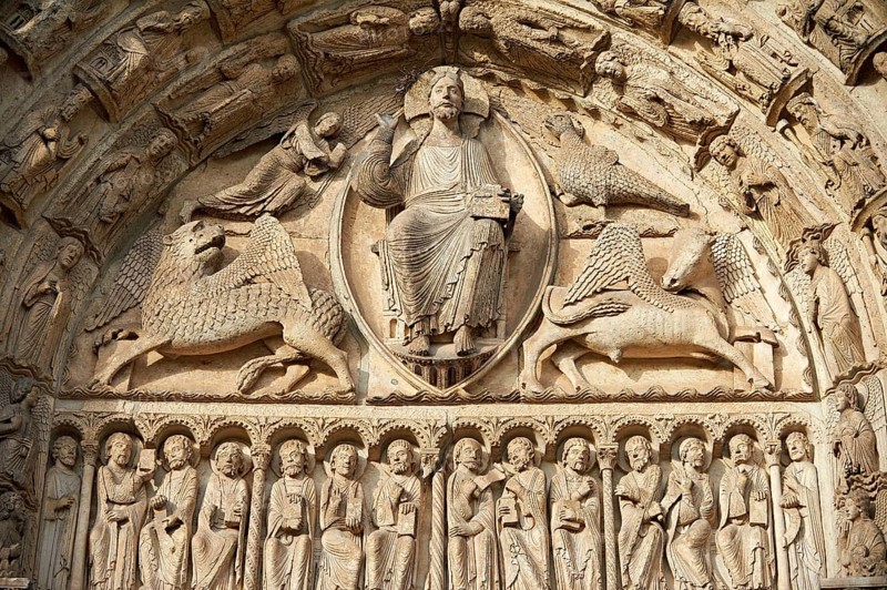 Gothic sculptures of Christ Pantocrator surrounded by the four Evangelist symbols