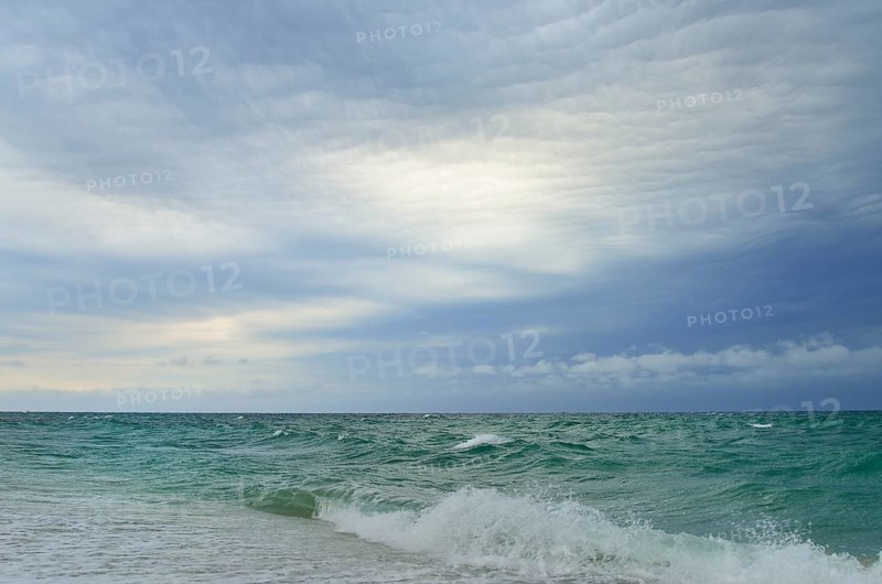 Storm clouds over the choppy sea