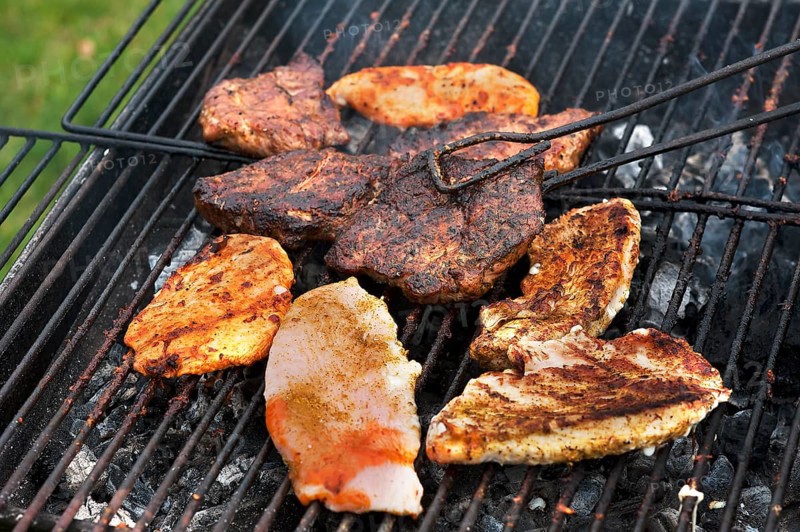 Heavily roasted meat on a charcoal grill