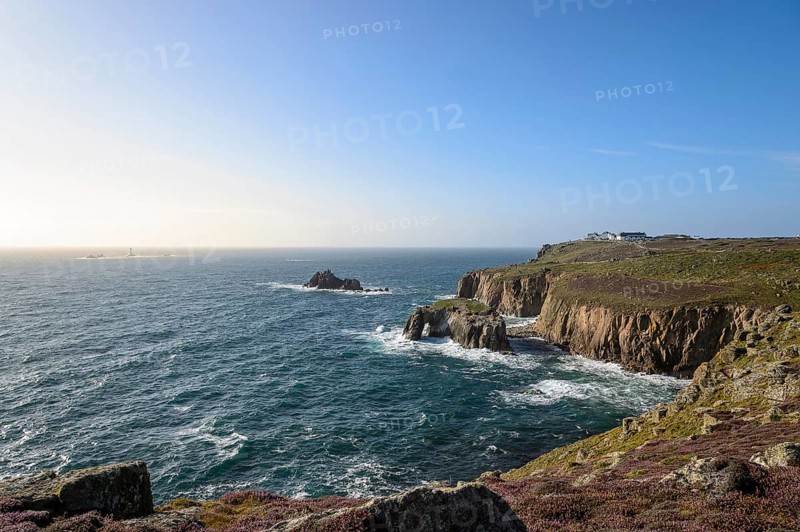 Rock arch and Armed Knight rocks on the rocky coast