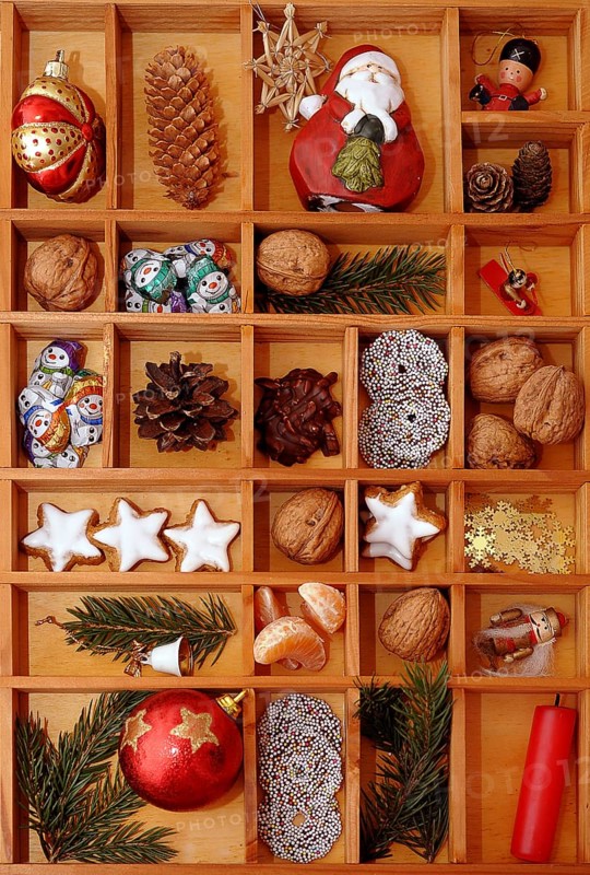 Christmas decorations and sweets in a type case or letter case