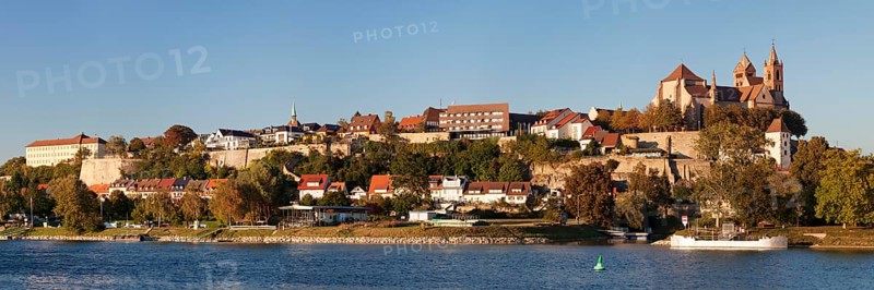 View across river Rhine to the Munsterberg hill with St. Stephansmunster cathedral