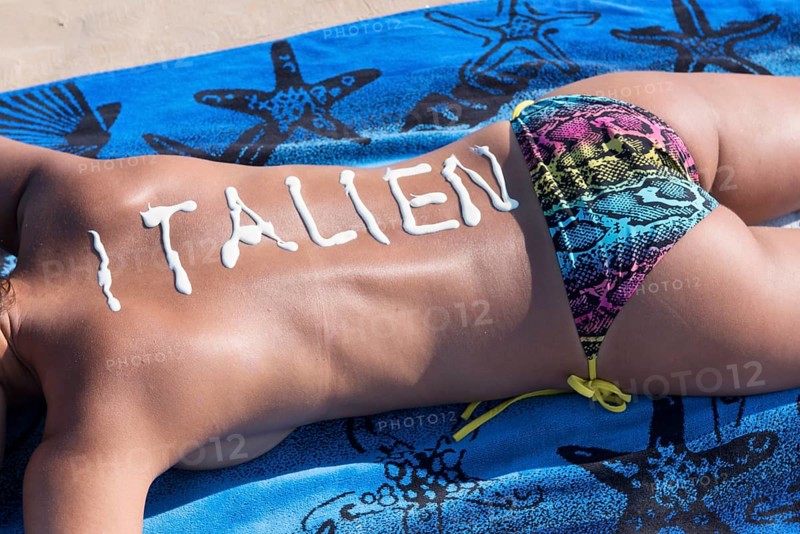 Woman lying on the beach
