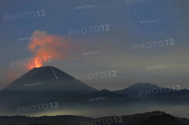 Active Gunung Bromo volcano at night