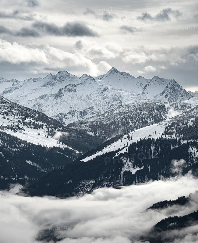 View of snow-covered main Alpine ridge with Grossvenediger