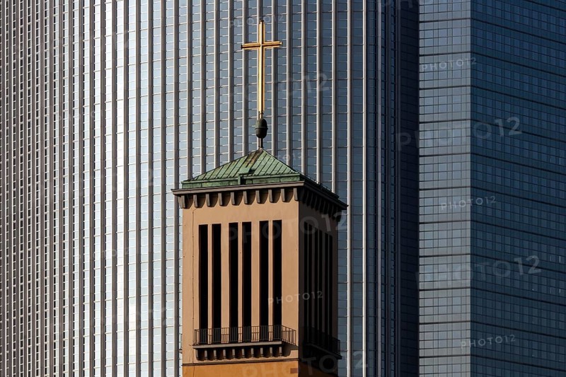 Steeple of the Church of Matthew in front of the Pollux building in Frankfurt am Main