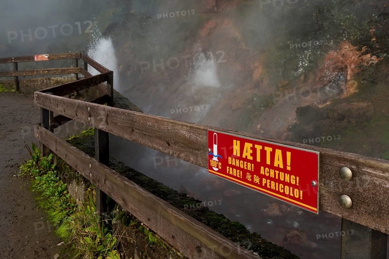 Warning sign on a fence