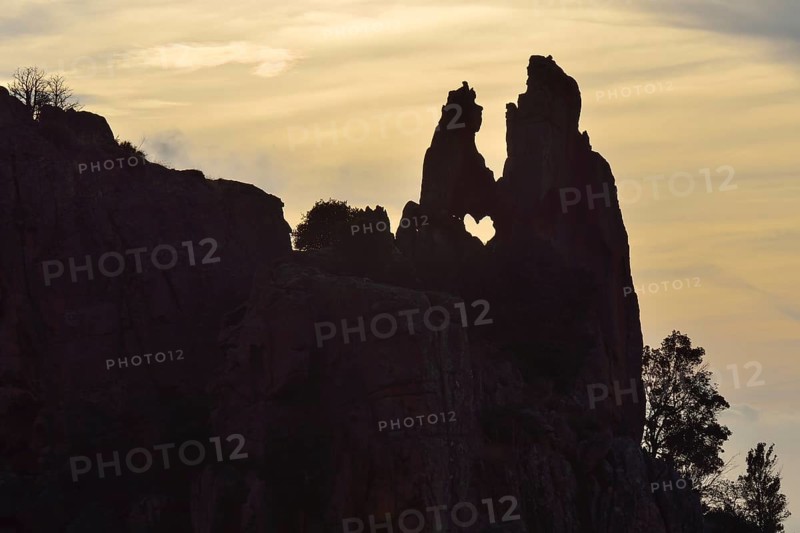 Heart-shaped hole in a rock in the Calanche