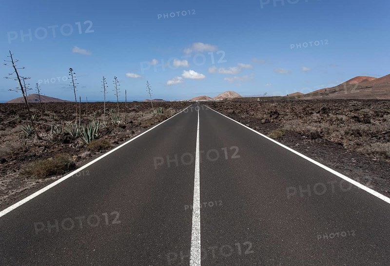 Road through volcanic landscape