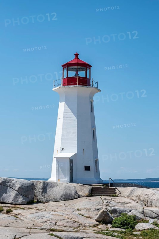 Lighthouse on granite rocks in Peggys Cove