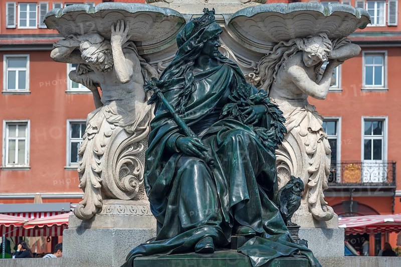 Sculpture of Alma Mater with the symbols of science at the Pauli Fountain from 1889