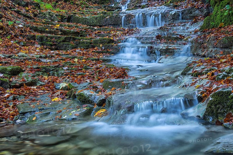 Waterfall in the forest in autumn