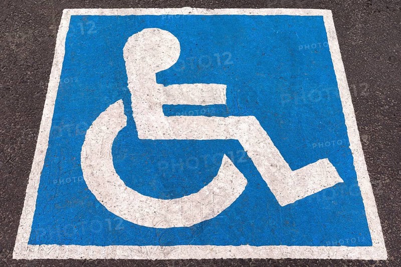 Blue marked parking place for disabled people