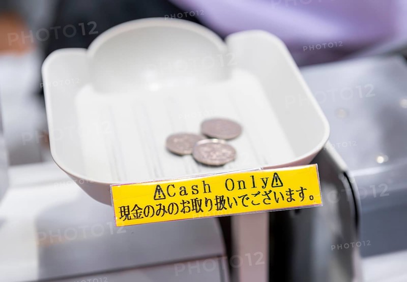 Money on cash register