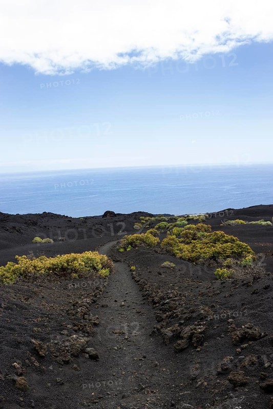 Hiking trail through lava landscape