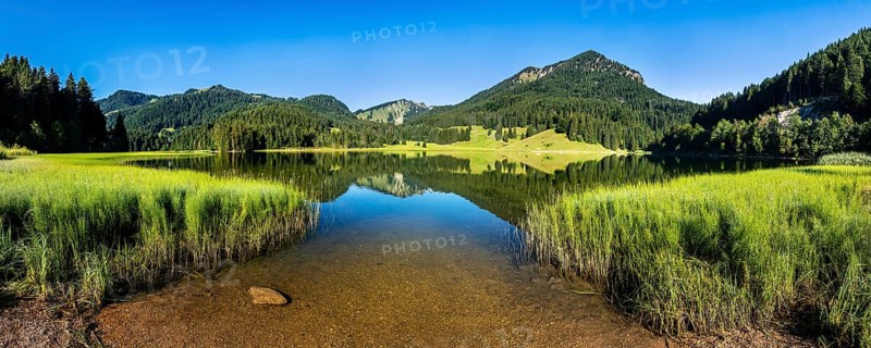 Mountains reflected in Lake Spitzingsee