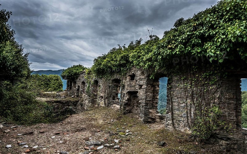 Ruins of the church of Santa Maria di Riscamone against dramatic sky