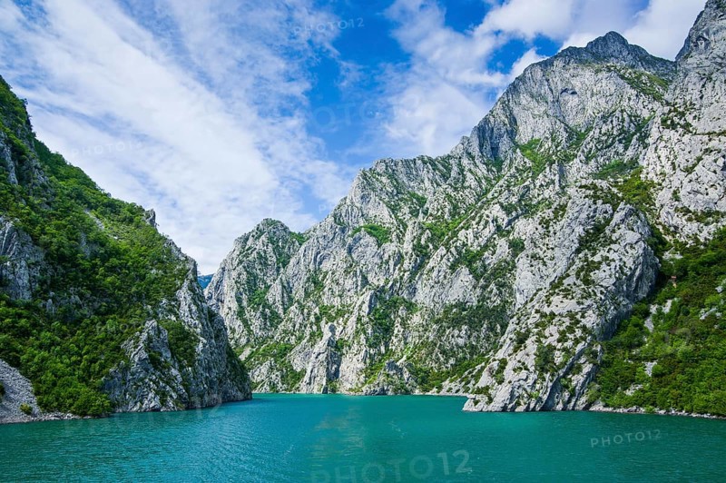 Sheer cliffs in the Koman water reservoir