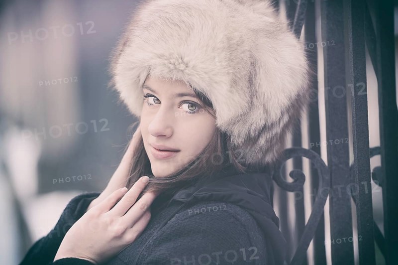 Young woman wearing a fur hat