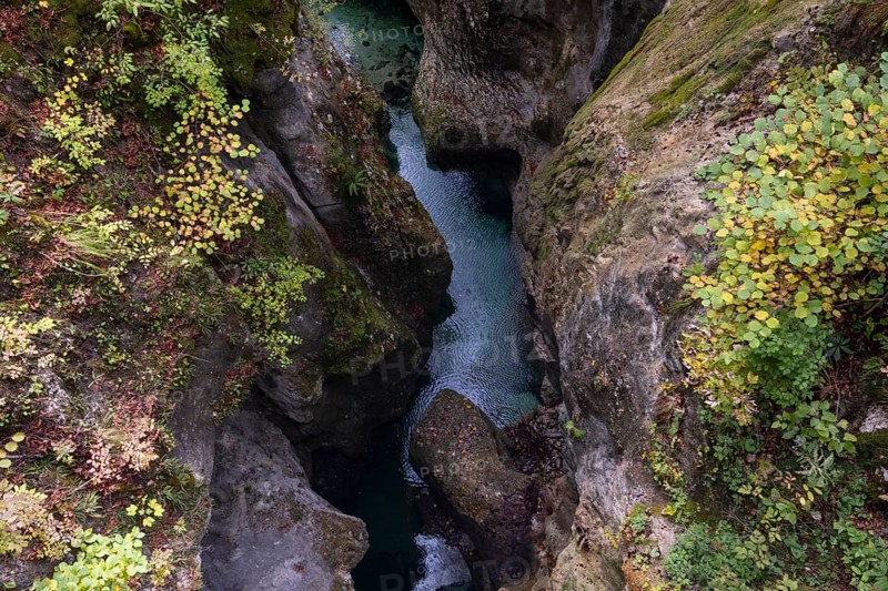 Mountain stream flows through a narrow gorge