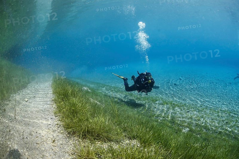 Diver next to the flooded trail