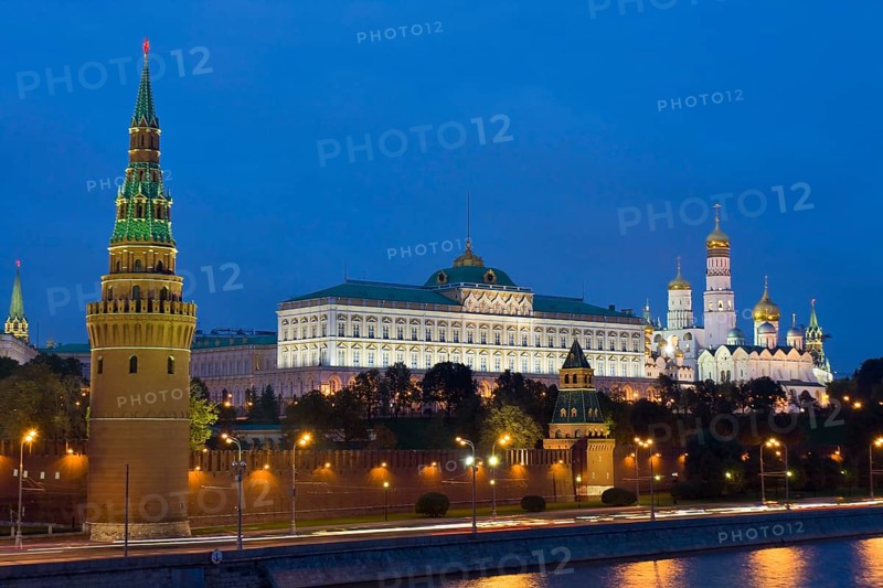 Moscow Kremlin with palace and cathedrals on Moskva River at night