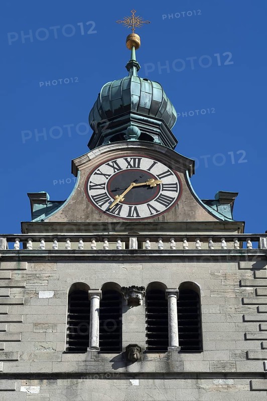 Clock tower of the Basilica of St. Emmeram against blue sky