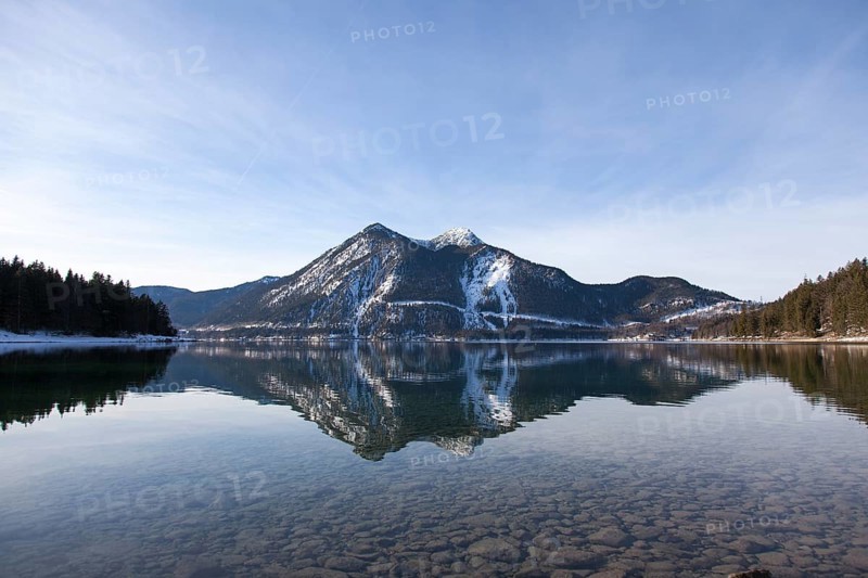 Walchensee or Lake Walchen and Herzogstand mountain in winter