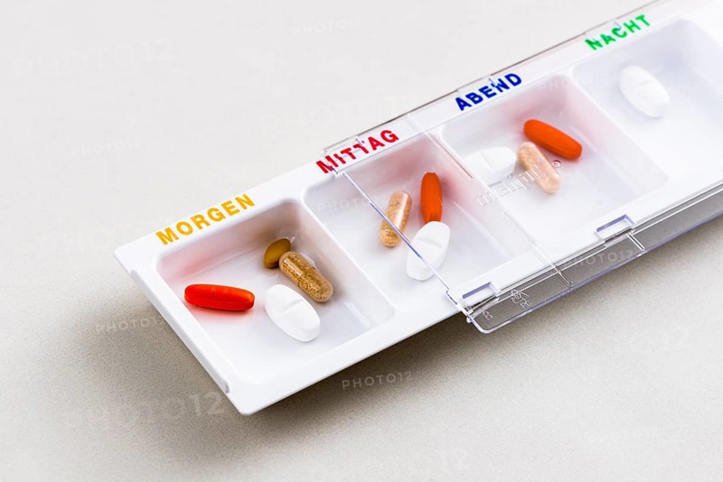 Tablet dispenser filled with pills for the whole day