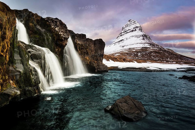 Peak of Kirkjufell with waterfall