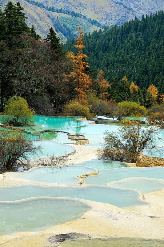 Lime terraces with lakes in autumnal environment