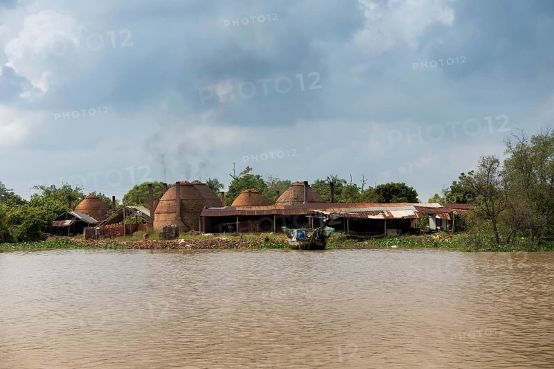 Charcoal burning in the Mekong Delta