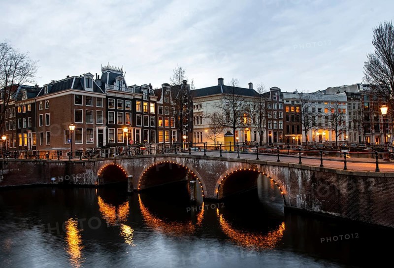 Canal with bridge at dusk