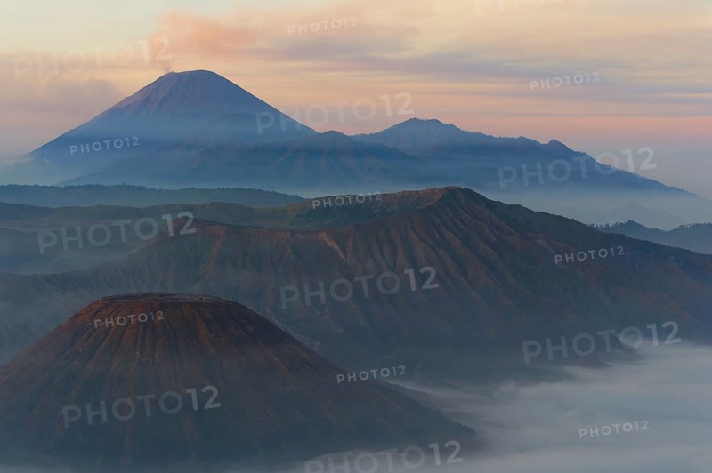 Sunrise over the smoking Gunung Bromo volcano