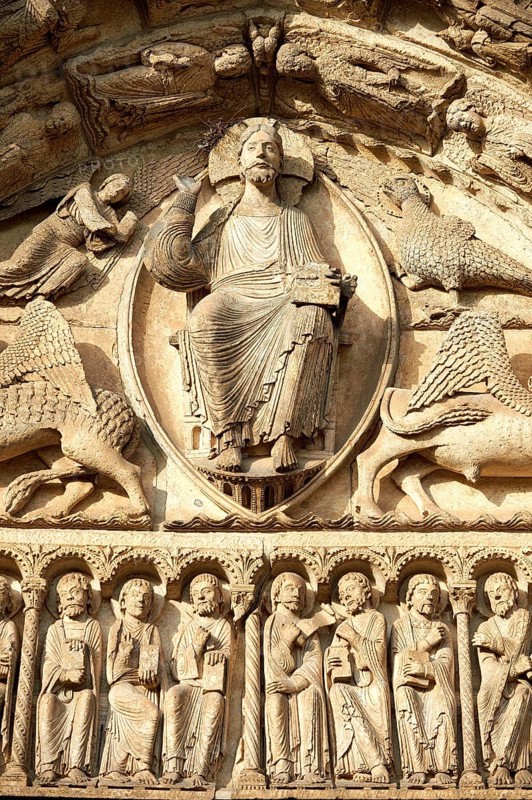 Gothic sculptures of Christ Pantocrator surrounded by the four Evangelist symbols