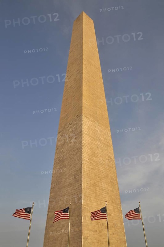 Washington Monument and flags of the United States