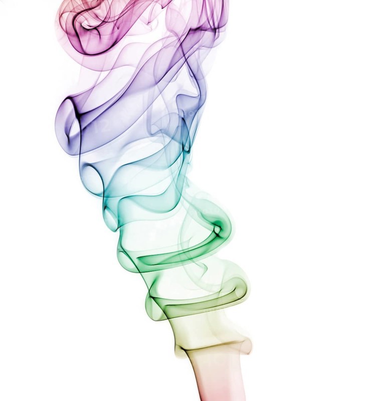 Colourful smoke from an incense stick or joss stick