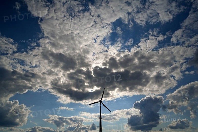tratocumulus and a wind turbine as a silhouette