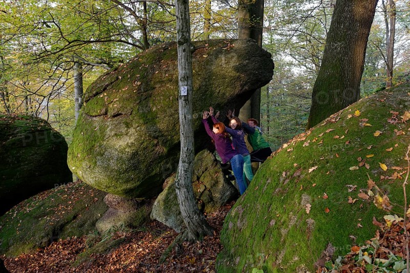 Family hiking in a rock park