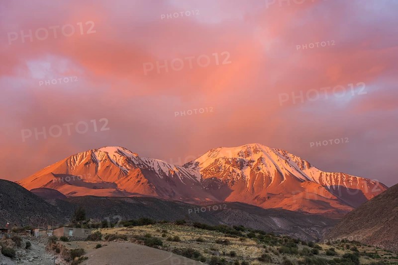 The Taapaca volcano at sunset
